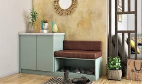 In what way does using light-coloured curtains make a small living room feel more open